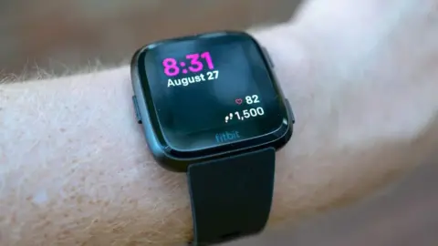 Smith Collection/Gado Fitbit Versa device