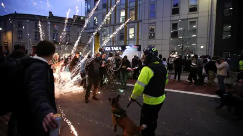 Reuters Firework being thrown in Bristol