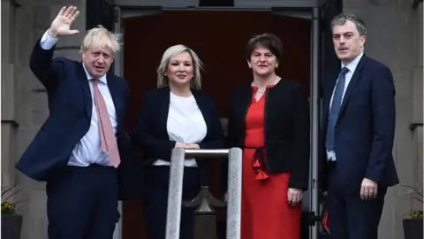 Charles McQuillan Boris Johnson, Michelle O'Neill, Arlene Foster and Julian Smith