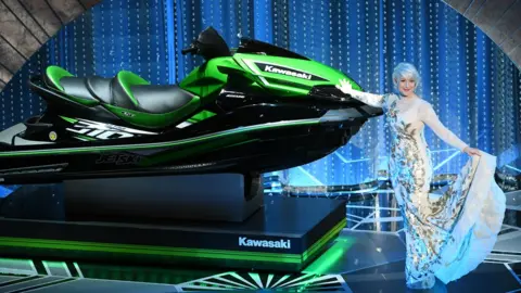 Getty Images Helen Mirren poses with a jet ski