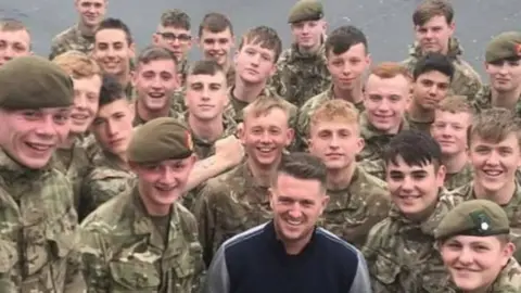 Tommy Robinson/Facebook Photograph posted by Tommy Robinson on Facebook with soldiers