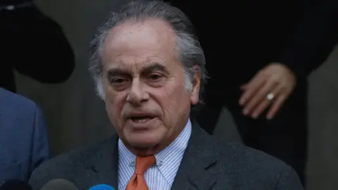Reuters Benjamin Brafman talking to reporters in New York in December 2018