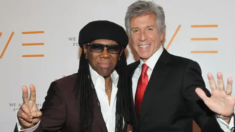 Getty Images Bill McDermott and Chic singer Nile Rodgers