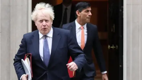 PA Media Boris Johnson and Rishi Sunak