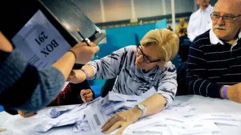 Getty Images Counting votes in the 2017 election