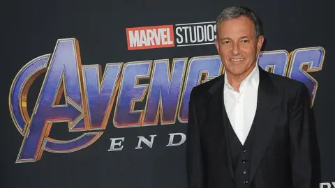 Getty Images Bob Iger in front of Avengers: Endgame logo