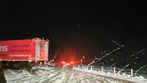 Rosie / weather watchers Lorry jack-knifed on M62