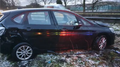 Highways England Car crashed into central reservation