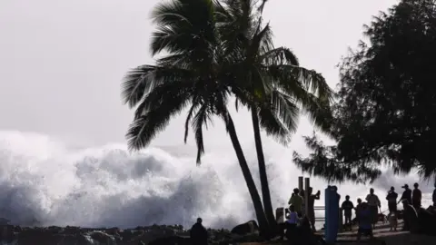 People look at high surf from Tropical cyclone Alfred at Snapper Rocks on the Gold Coast, Queensland, Australia, 06 March 2025.