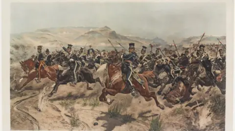 National Army Museum The image is a historical painting showing a cavalry charge across a battlefield. It shows a large group of mounted soldiers advancing across rough terrain.