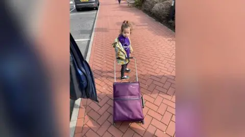 Kidney Research UK Poppy with her suitcase