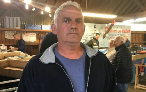 Frank Tousch pictured indoors at at Dives-sur-Mer