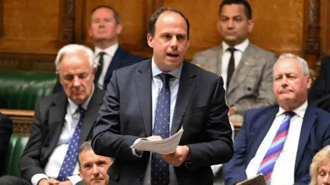 Reuters Greg Smith in parliament