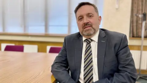 PA Media Robin Swann