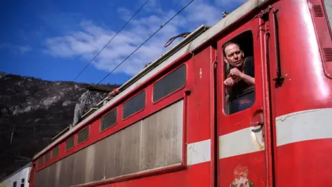 Getty Images A picture of an old read train carriage in Bulgaria