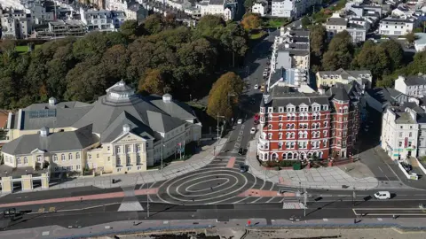 Manx Scenes An aerial view of the roundle at Broadway on the promenade, with the Villa Marina to the left.