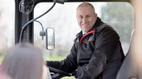 Getty Images Male bus driver