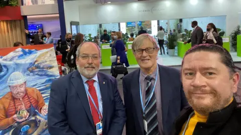 Gennadiy Ivanov Professor John Pomeroy, Trevor Davies, and Gennadiy Ivanov