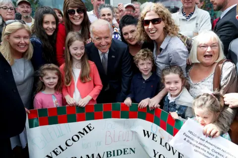 MerrionStreet.ie A Blewitt family banner welcomed Joe Biden to Ballina in 2016