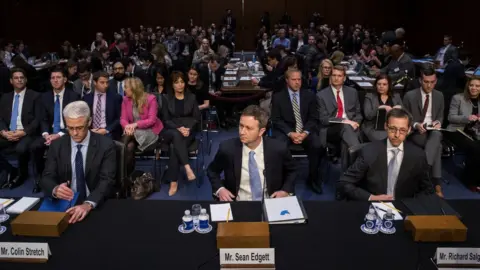 Getty Images Social media representatives at a congressional hearing