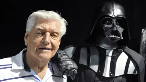 Getty Images Dave Prowse with 'Darth Vader'