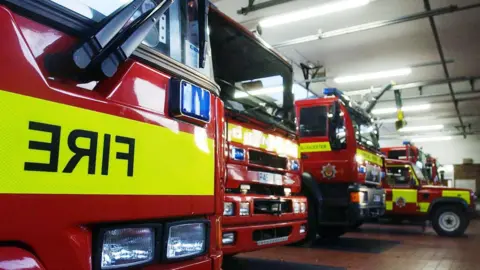 PA Media Generic image showing fire engines parked in a row.