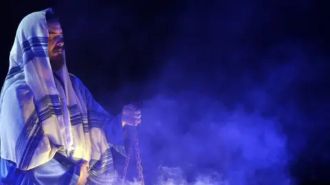 EPA Tunisian members of the El Hadhra Chants Soufis group perform in Sidi Bou Said, near Tunis in Tunisia