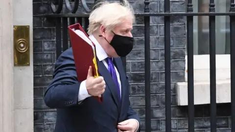 PA Media Boris Johnson in Downing Street on 2 December