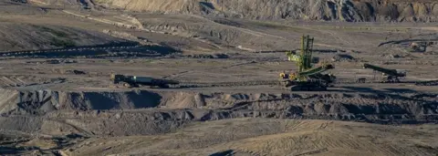 EPA A giant belt spreader at the Turow lignite mine, operated by PGE company, in Bogatynia, Poland, 14 June 2021