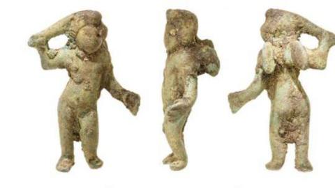  A small figurine from different angles 