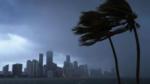 Getty Images Miami skyline as outer bands of Irma reach southern Florida - 9 September