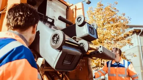 Getty Images Bin workers