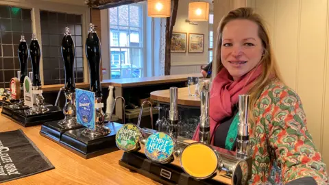 Guy Campbell/BBC Owner Leonora Faggionato behind the bar