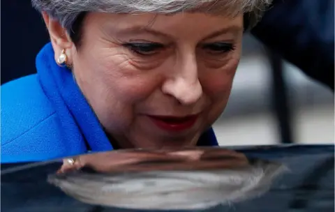 AFP Britain's Prime Minister and leader of the Conservative Party Theresa May leaves 10 Downing Street