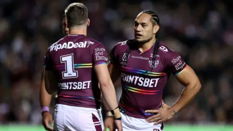 Getty Images Two Sea Eagles players