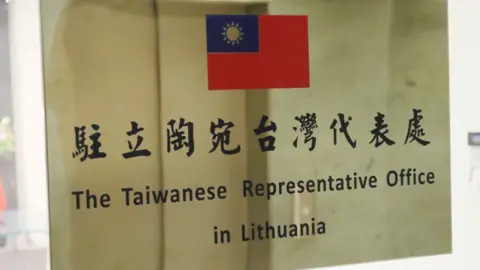 EPA A sign announcing Taiwan's representative office in Lithuania