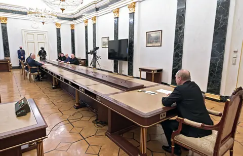 SPUTNIK / AFP Russian President Vladimir Putin chairs a meeting on economic issues at the Kremlin in Moscow on February 28, 2022