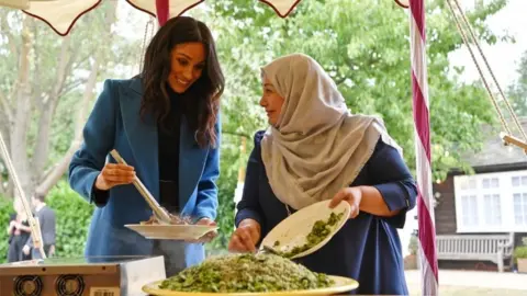 PA Meghan serving food