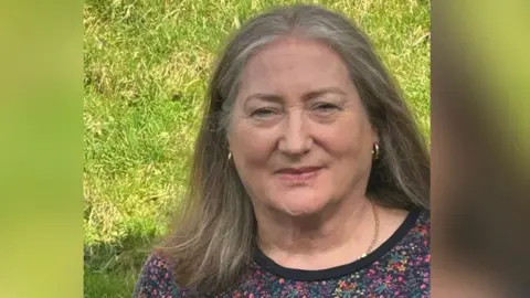 University of Northampton Woman with long dark hair