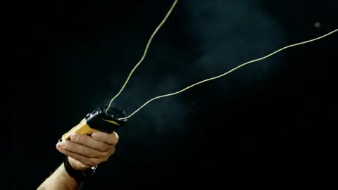 Wrap Technologies The BolaWrap, a device designed to entangle an individual in a cord, restricting their movement