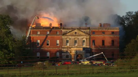 PA Media Clandon Park on fire