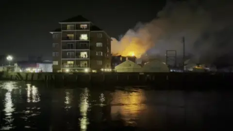 Andrew Turner/BBC Fire at Haven Bridge in Great Yarmouth