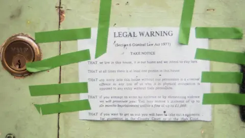 Dave Kotula This legal warning notice had to be fixed to all external walls to stop eviction without a court summons, Lattimore Road, 1986