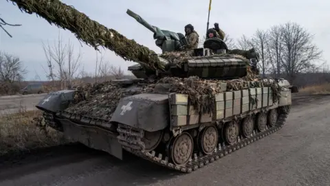 Getty Images Ukrainian forces driving a tank