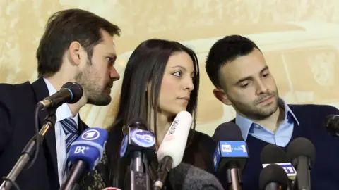 Getty Images Meredith Kercher's brother and sister with their lawyer
