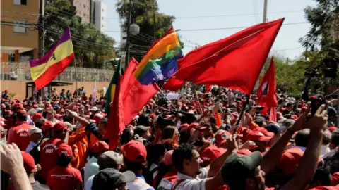 Reuters Supporters of former Brazilian President Luiz Inacio Lula da Silva, await his testimony at the Federal Court in Curitiba,