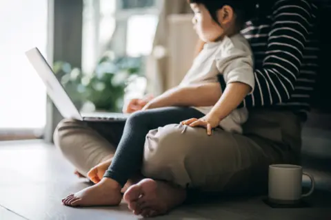 Getty Images A woman and her child