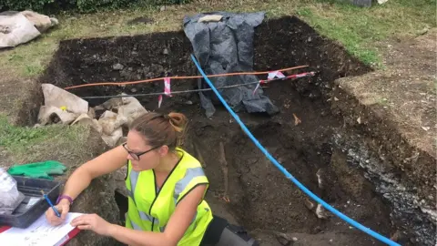 Lisa White works at excavation site at Down Cathedral
