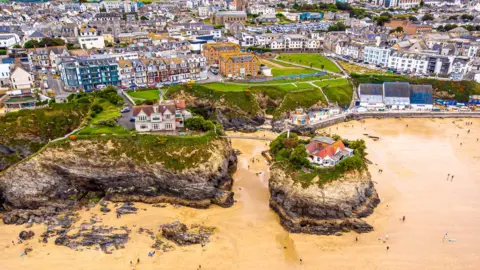 Getty Images Aerial view of houses next to Newquay beach