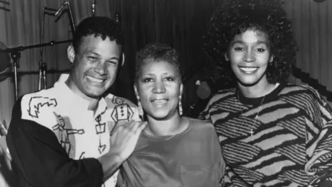 Getty Images Producer Narrada Michael Walden with Aretha Franklin and Whitney Houston